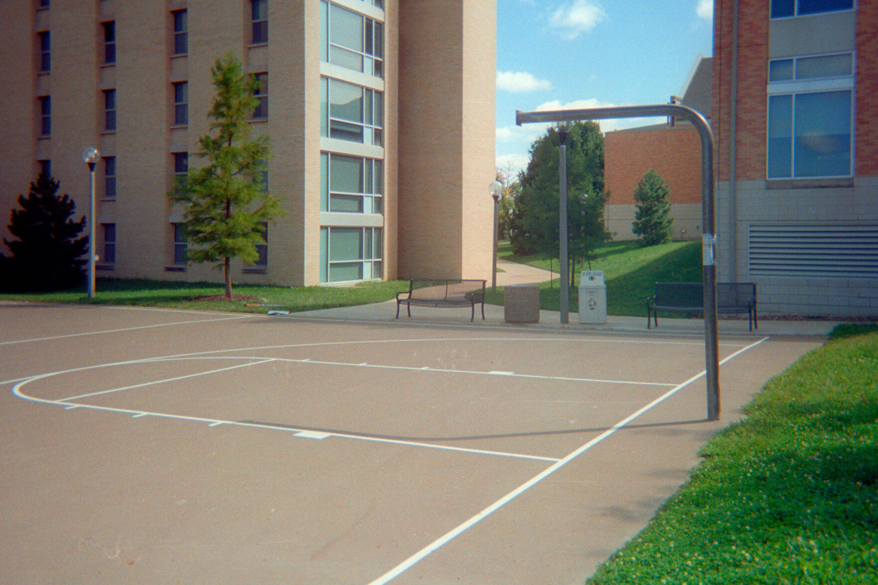 I noticed a basketball hoop without a net outside of the College Crossing